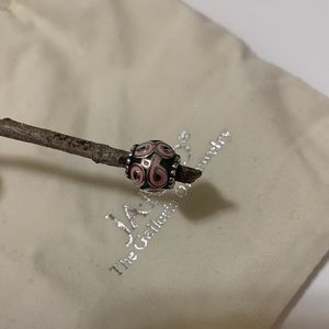 Panddora breast cancer awareness bead.